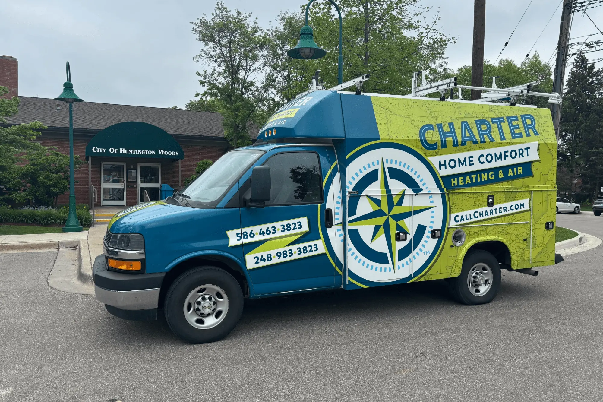Charter Home Comfort Van Parked in from of Huntington Woods Town Hall 
